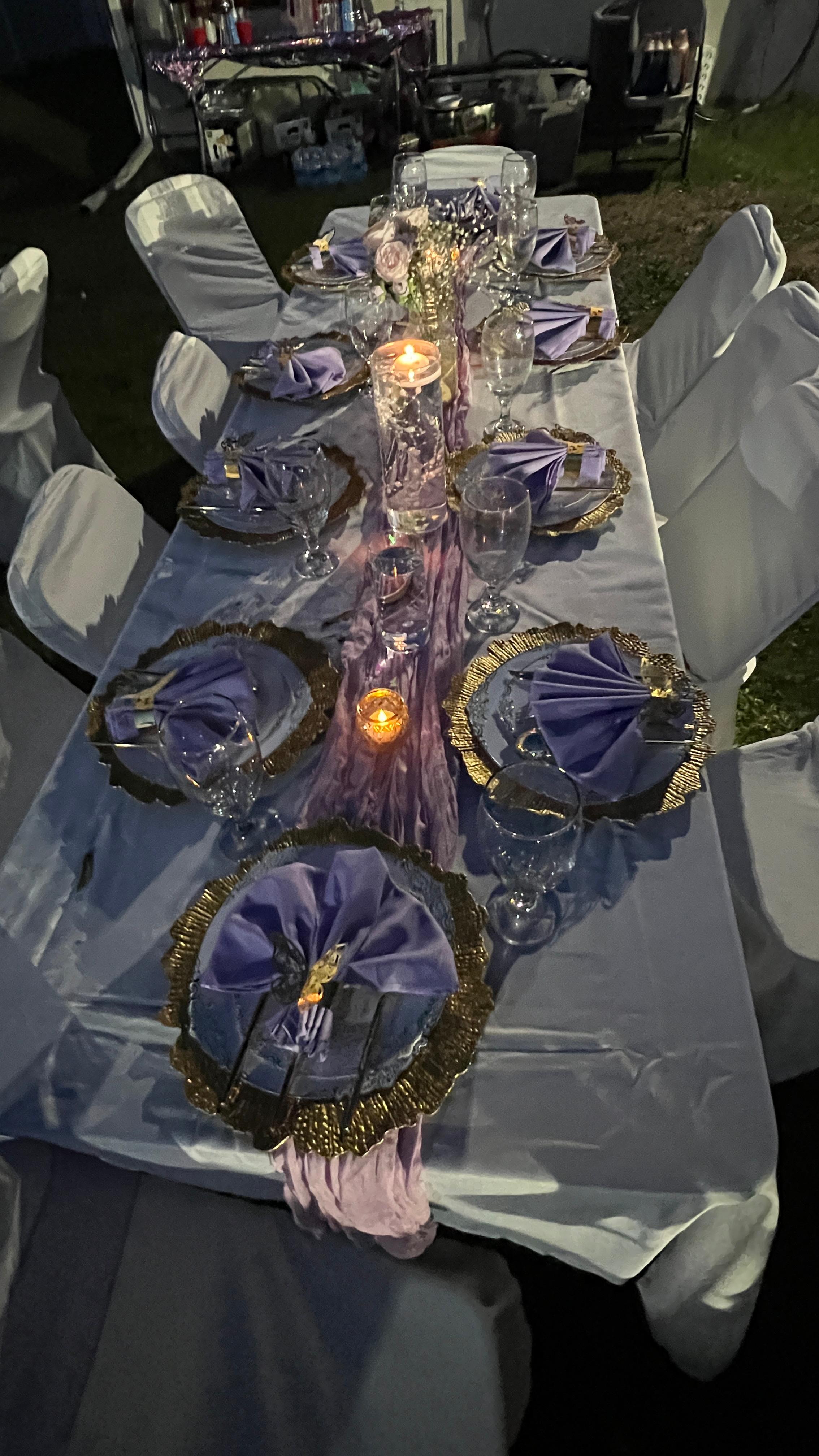 Lavender candlelit tablescape with gold chargers
